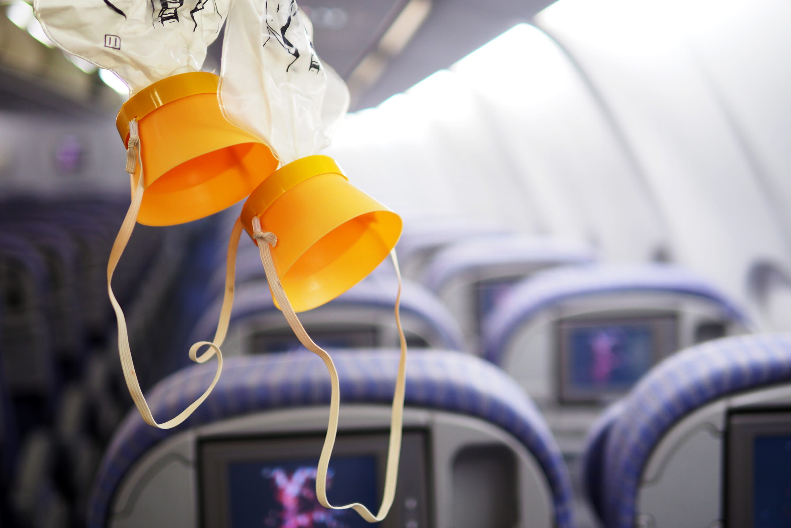cabin oxygen mask drop from the cabin ceiling